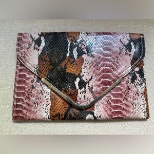 BCBGeneration Black, Pink, Orange Clutch with Snakeskin Pattern